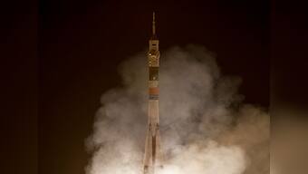 Russia's Soyuz capsule with three astronauts on board docks with space station