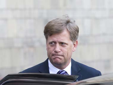 The U.S. Ambassador to Russia Michael McFaul leaves Foreign Ministry headquarters in Moscow on Wednesday. BCCI
