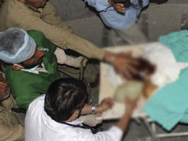 Sanaullah Haq is carried out of a Jammu hospital. PTI