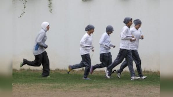 Saudi schoolgirls allowed to play sports, but in 'decent dress' 