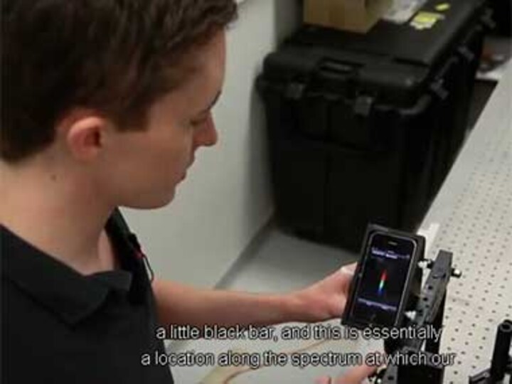 App and cradle system lets smartphone camera detect toxins, bacteria and more