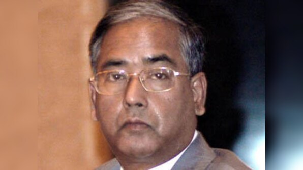 Invest in stocks, Sebi chief urges small investors 