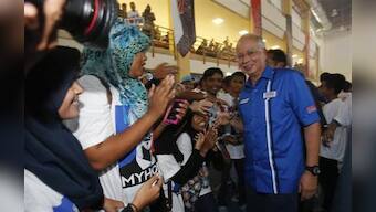 Malaysia's &quot;class war&quot; fuels opposition election hopes