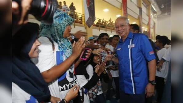 Malaysia's &quot;class war&quot; fuels opposition election hopes