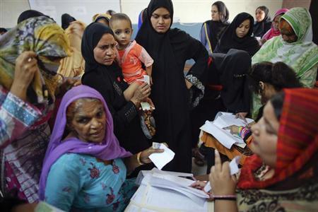 In Pakistan, voters brave chaos and long lines – Firstpost