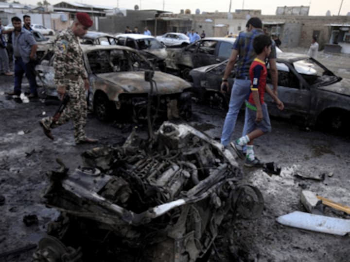 After bombings kill 33, worried Iraqi authorities plan car ban to stop attacks