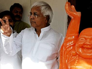 Lalu Prasad Yadav has booked 13 trains for his rally. AFP.