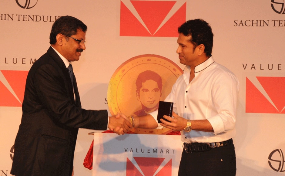 Sachin with the owner of Valuemart Gold and Jewels Ltd. Firstpost photo.