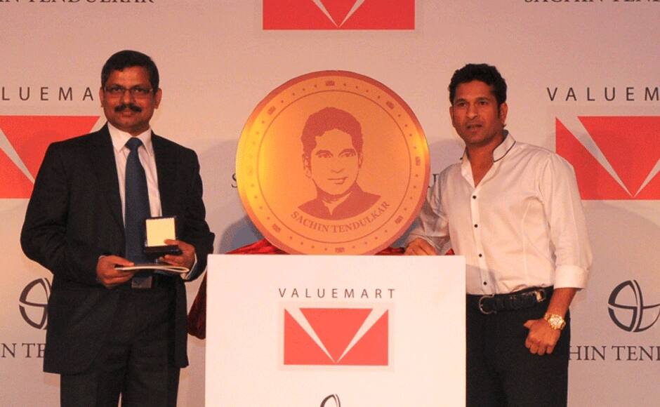 Sachin with the replica of the gold coin. Firstpost photo. 