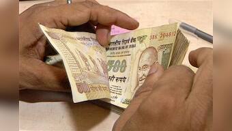Rupee hits 11-month low; posts worst monthly fall in year