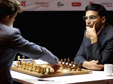 Carlsen hands Anand shock defeat in Tal Memorial Carlsen hands Anand shock defeat in Tal Memorial