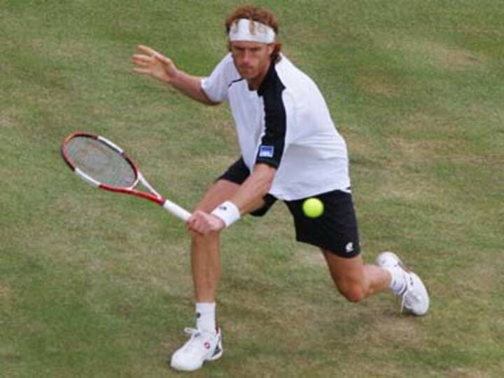 Dick Norman retires from professional tennis