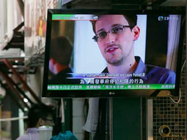 Edward Snowden claims he is not hiding in Hong Kong. AP