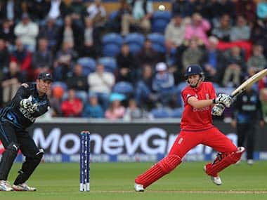 England captain Joe Root, left, square cuts watched by New Zealand wicketkeeper Luke Ronchi, at the SWALEC Stadium, Cardiff, Wales. AP