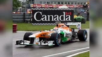 Force India celebrates 100th GP with double points