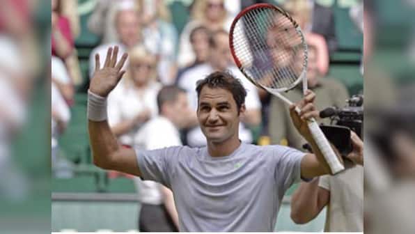 Federer overcomes Youzhny in Halle for first title of the year