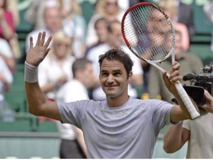 Federer overcomes Youzhny in Halle for first title of the year Federer overcomes Youzhny in Halle for first title of the year