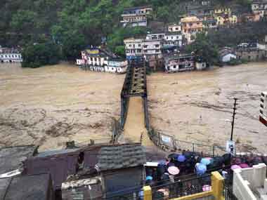 A view of a submerged bridge over river Ganga in Rudraprayag, Uttarakhand on Tuesday following incessant rains. PTI 