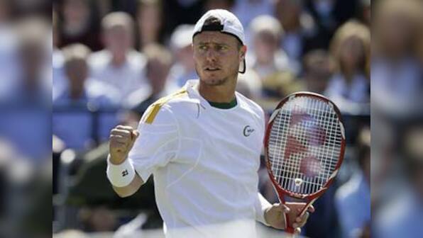 Hewitt rolls back years to beat Del Potro at Aegon