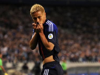 Japan becomes first Asian country to qualify for Brazil 2014 Japan becomes first Asian country to qualify for Brazil 2014