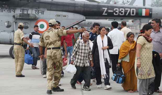 Rescued people arrive at Jolly Grant airport, in Dehradun, Uttarakhand. Image courtesy PIB