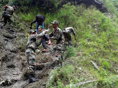 Army conducting rescue operations. AP image
