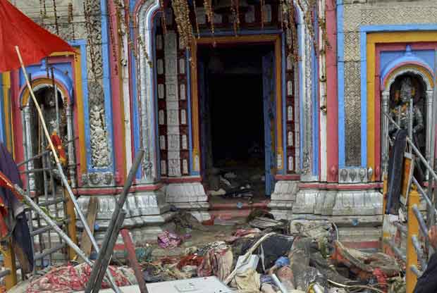 Bodies of flood hit pilgrims lying near Kedarnath shrine, one of the holiest of Hindu temples dedicated to Lord Shiva, after heavy rains in Uttarakhand on Thursday. PTI