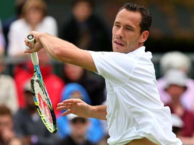 Another one bites the dust as Llodra retires hurt from Wimbledon Another one bites the dust as Llodra retires hurt from Wimbledon