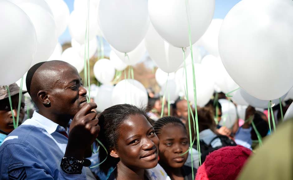 Children release 95 white balloons to mark the upcoming 95th birthday on July 18 of ailing former South African President Nelson Mandela outside the Medi-Clinic Heart Hospital where he is being treated in Pretoria: Reuters Children release 95 white balloons to mark the upcoming 95th birthday on July 18 of ailing former South African President Nelson Mandela outside the Medi-Clinic Heart Hospital where he is being treated in Pretoria: Reuters