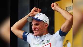 Contador down as Kittel wins chaotic Tour start