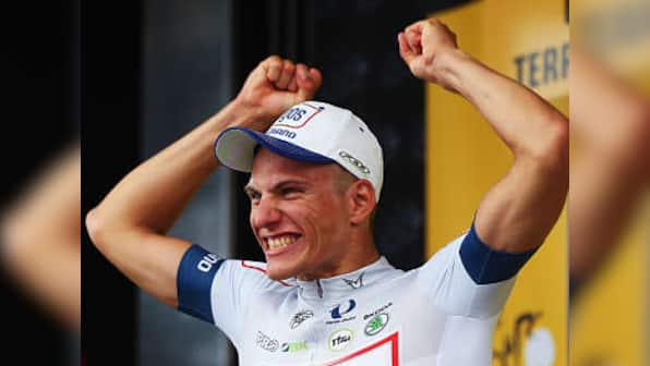 Contador down as Kittel wins chaotic Tour start