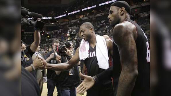 NBA finals: Heat survive Spurs in OT, force deciding Game 7