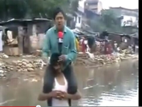 Reporter Narayan Pargaein Gets Sacked For Flood Report Atop Victims Shoulders India News 5124