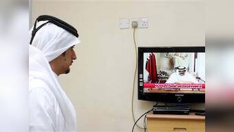 Qatar emir steps aside for his son in rare transfer of power