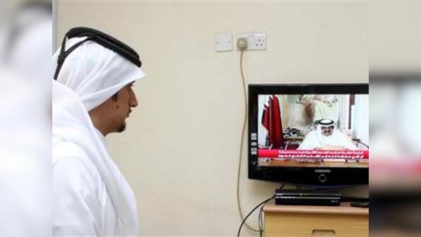 Qatar emir steps aside for his son in rare transfer of power