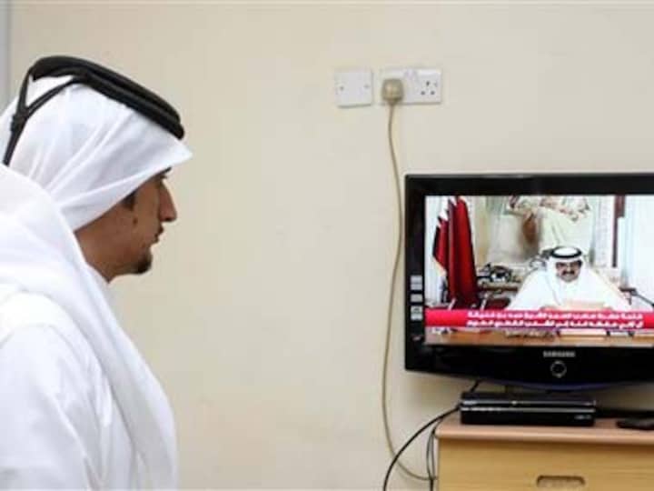 Qatar emir steps aside for his son in rare transfer of power