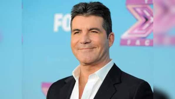 Simon Cowell egged by lady contestant on Britain's Got Talent show