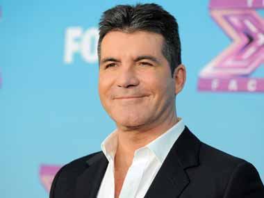 Simon Cowell egged by lady contestant on Britain's Got Talent show Simon Cowell egged by lady contestant on Britain's Got Talent show