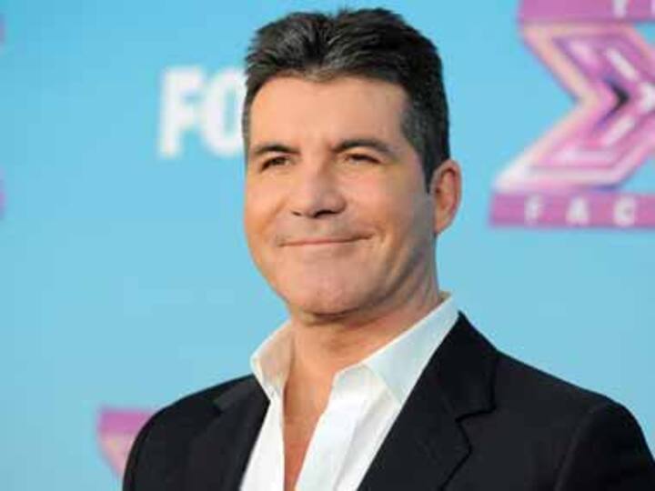 Simon Cowell egged by lady contestant on Britain's Got Talent show Simon Cowell egged by lady contestant on Britain's Got Talent show