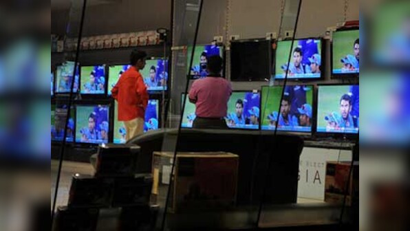 Budget 2014: PM Modi woos 'sandwiched class' with cheaper TVs 