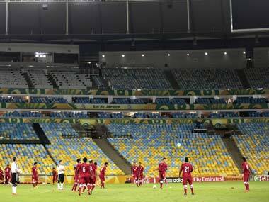 Tahiti players train at the Maracana stadium. AP