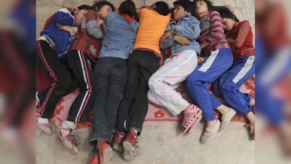 Lucky escape for Chinese child who fell from 4th storey building