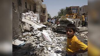 At least 70 people killed in wave of bombings in Iraq