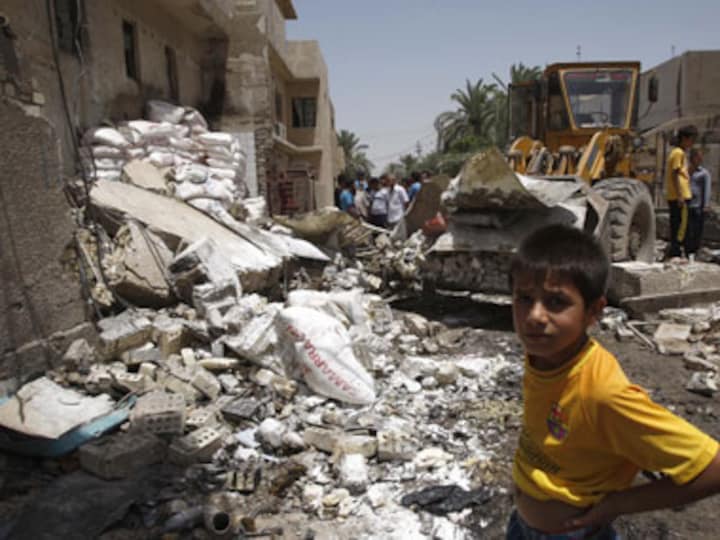 At least 70 people killed in wave of bombings in Iraq