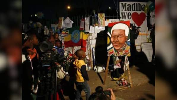 Choir sings and prays outside hospital for Nelson Mandela