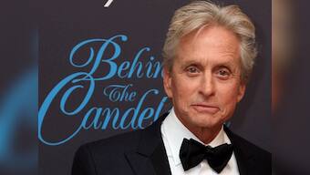 Michael Douglas says performing oral sex gave him cancer