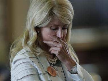 Wendy Davis reacts after she was called for a rules violation during her filibusters of an abortion bill. AP image