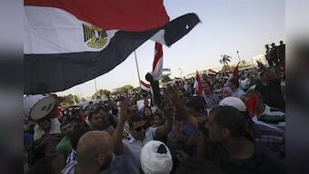 Egypt: 14 dead as Mursi opponents and supporters clash
