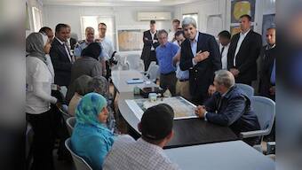 Angry Syrian refugees demand help from Kerry at camp