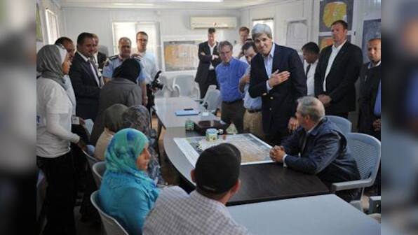 Angry Syrian refugees demand help from Kerry at camp
